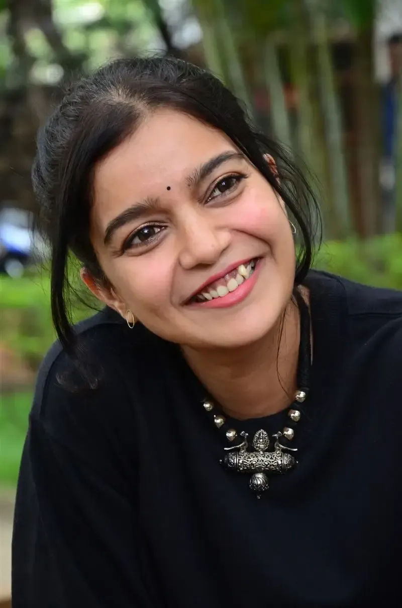 Actress Colors Swathi in Black Dress at Month Of Madhu Movie Press Meet